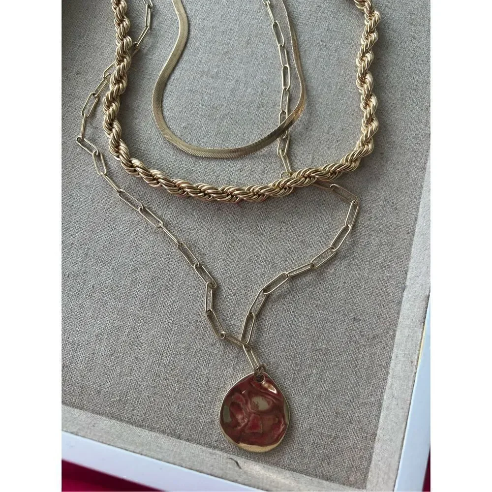 Chunky Gold necklace layered look